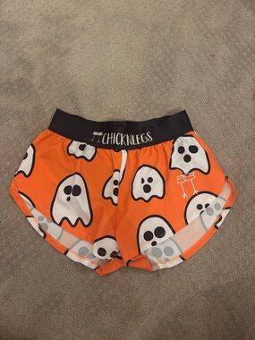 Chicknlegs Women's Orange Ghost Print Athletic Shorts